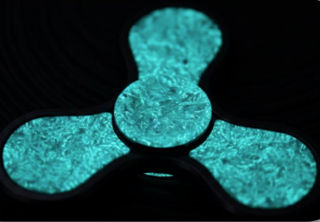 Luminescent forged carbon fiber block for sporting goods and custom handles