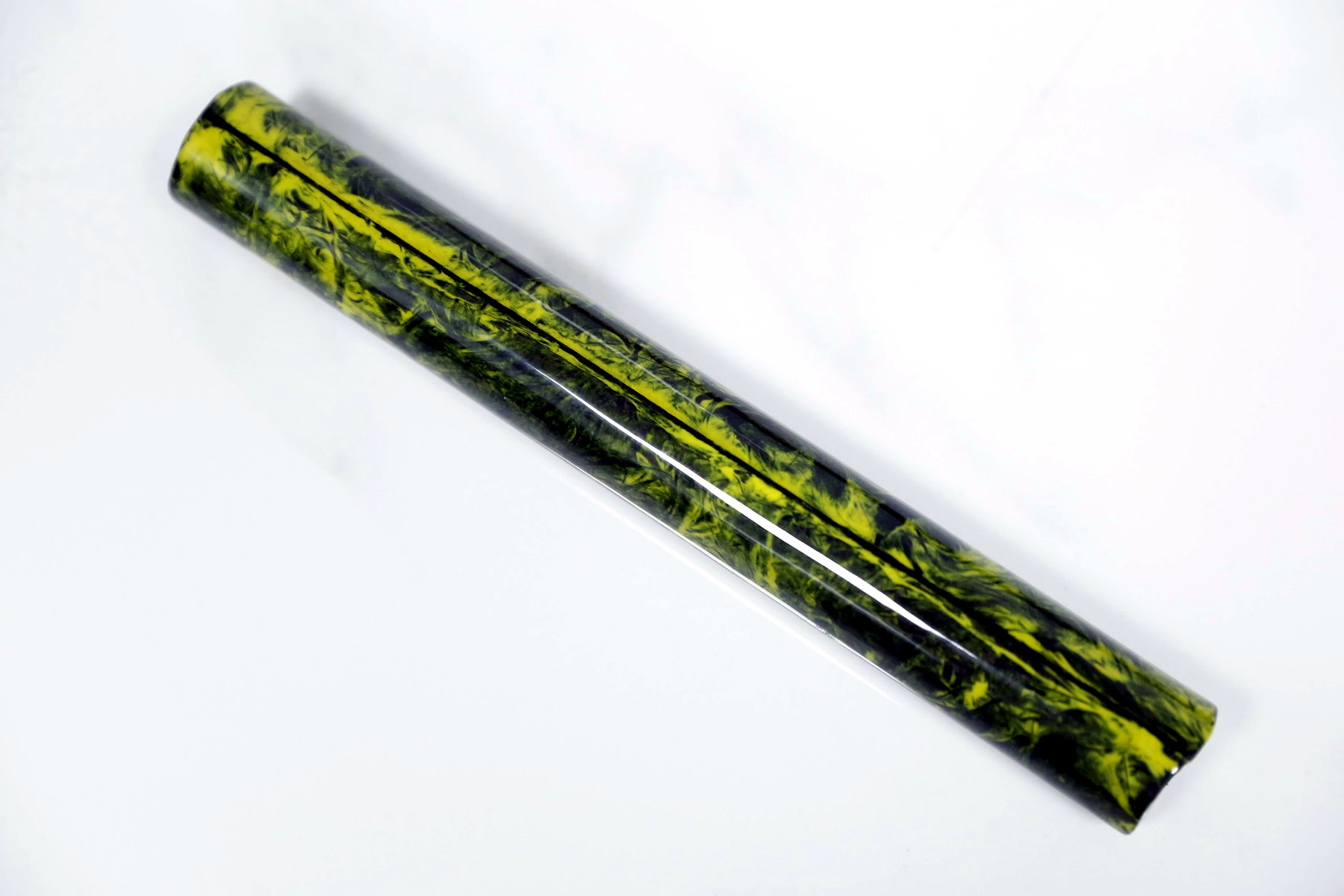 Yellow and green colored forged carbon fiber tube for machining and custom components