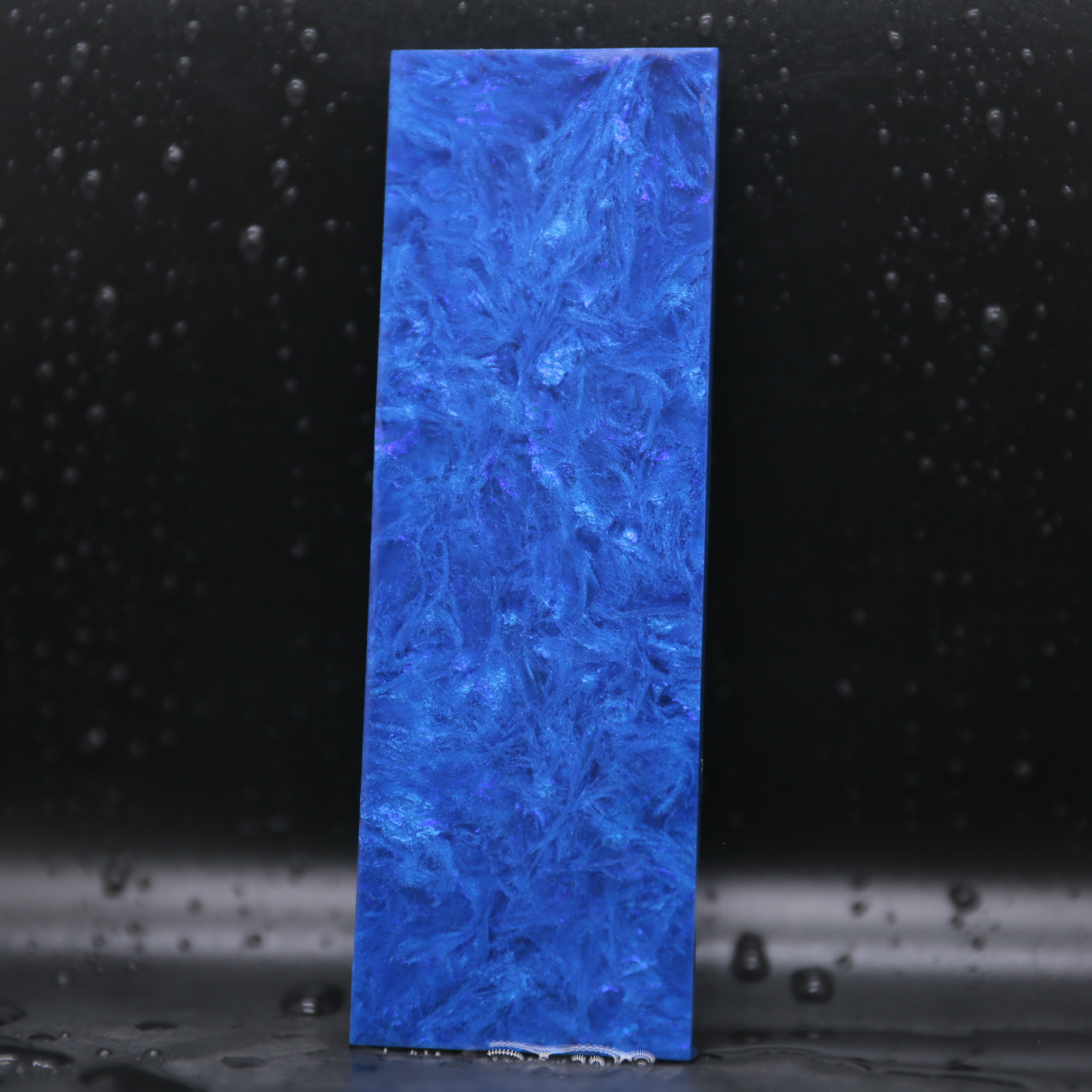 Night Collection forged carbon composite sheet and panel material with hidden blue emerald copper or violet tones for luxury products.
