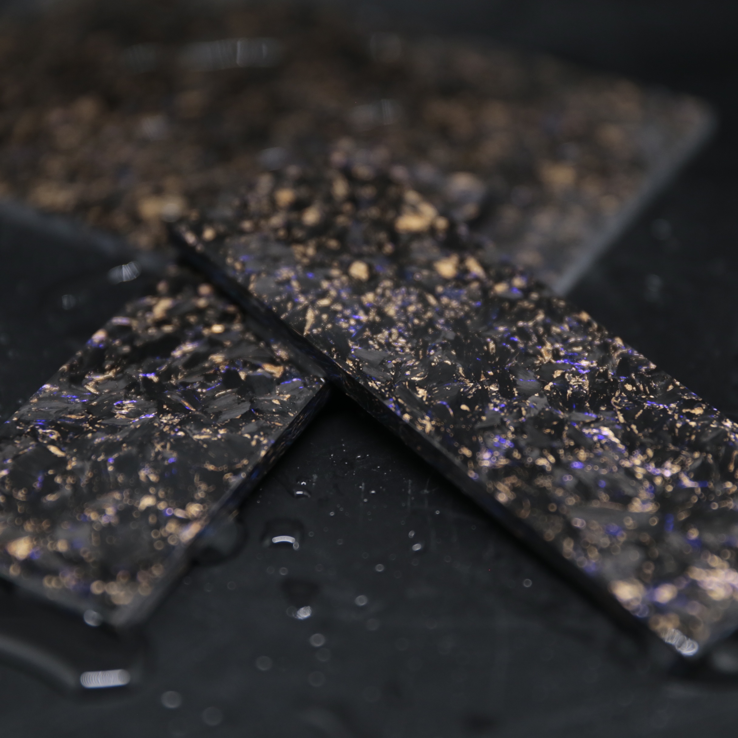 Close detail of premium forged carbon fiber plate material with metallic texture
